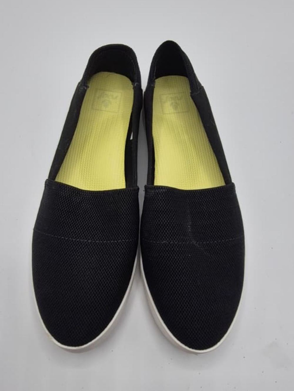 Reef Black Slip-On Flats with Yellow Insoles